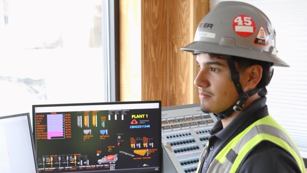 Texas State CIM student Omar visits a Texas Materials ready-mix plant in Hutto, Texas, during a Skate4Concrete internship industry excursion.